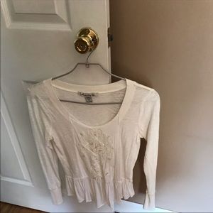 Womens size medium American rag top.  Worn maybe twice off white color